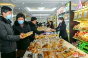 2022年12月に平壌で行われた小麦粉でできた食品の展示会（画像：労働新聞）
